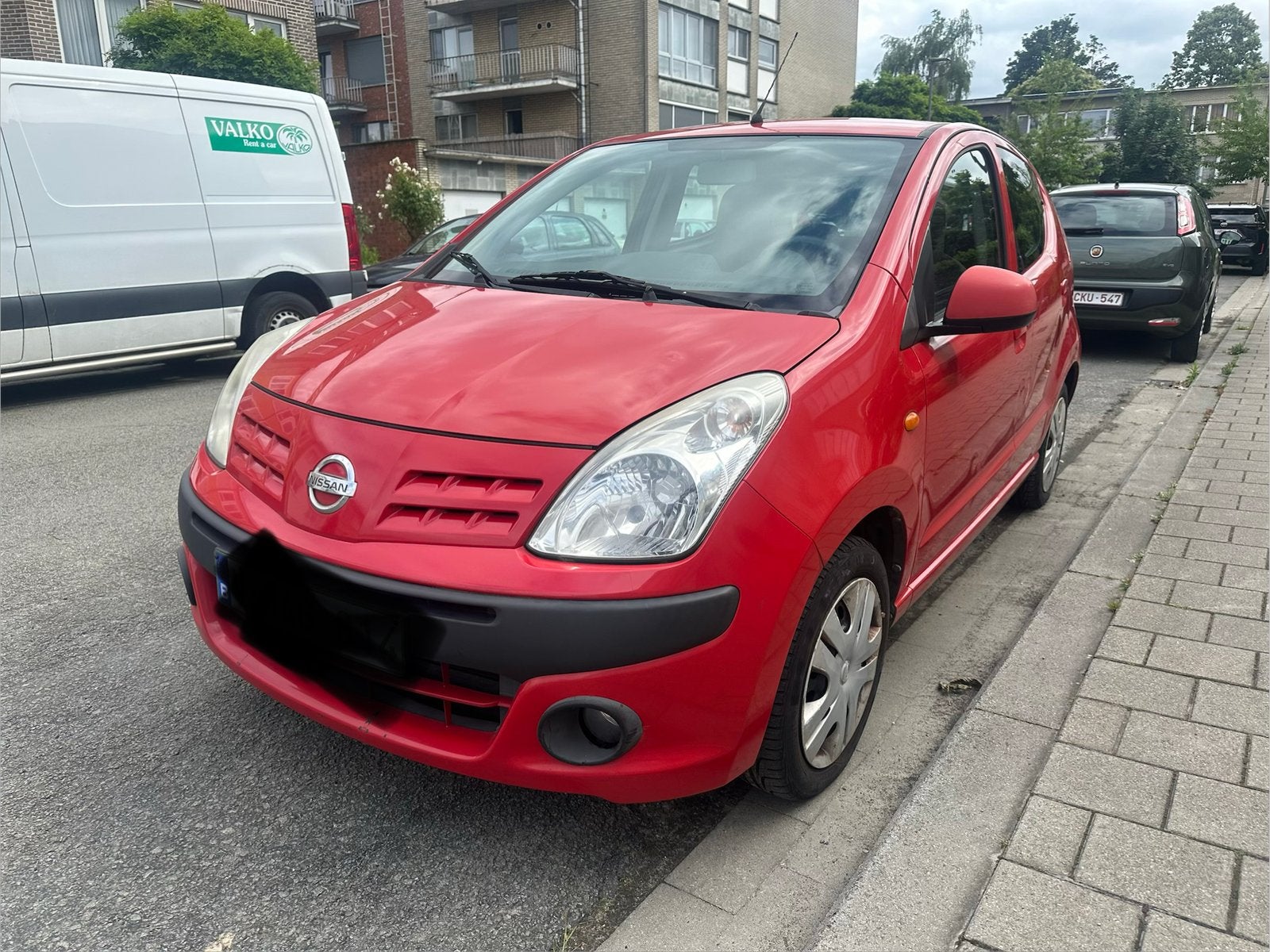 Nissan Pixo 1.0 Airco, Autos, Nissan, Rouge, Euro 5, Boîte manuelle, Noir
