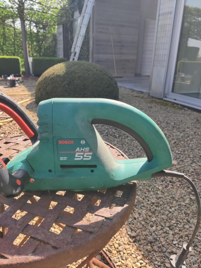 Bosch heggenschaar electrisch, Ophalen