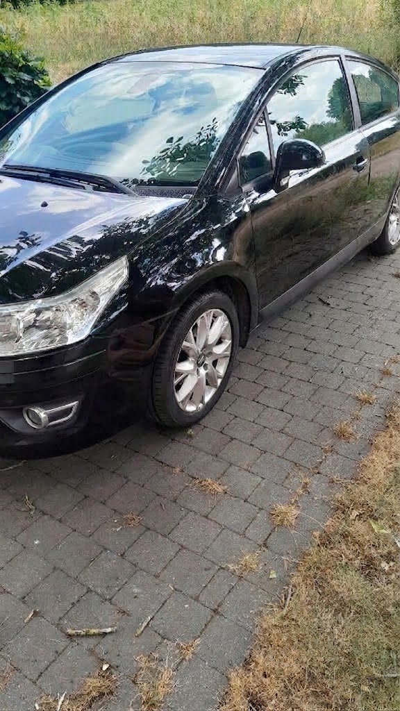 CITROËN C4 1.6VTI Coupé 120PK, Bwj 2009, zwart, 163.748Km, Voorwielaandrijving, Sound system, Stof, Zwart