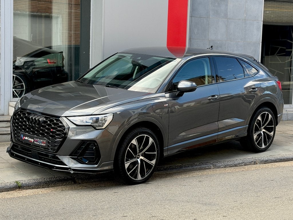 Audi Q3 Sportback Coupe 45 TFSie*S-Line*1 jaar garantie*, Auto's, Audi, Automaat, Zwart, Leder, SUV of Terreinwagen