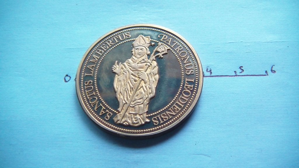 médaille liége 1 denarius 1980, Enlèvement