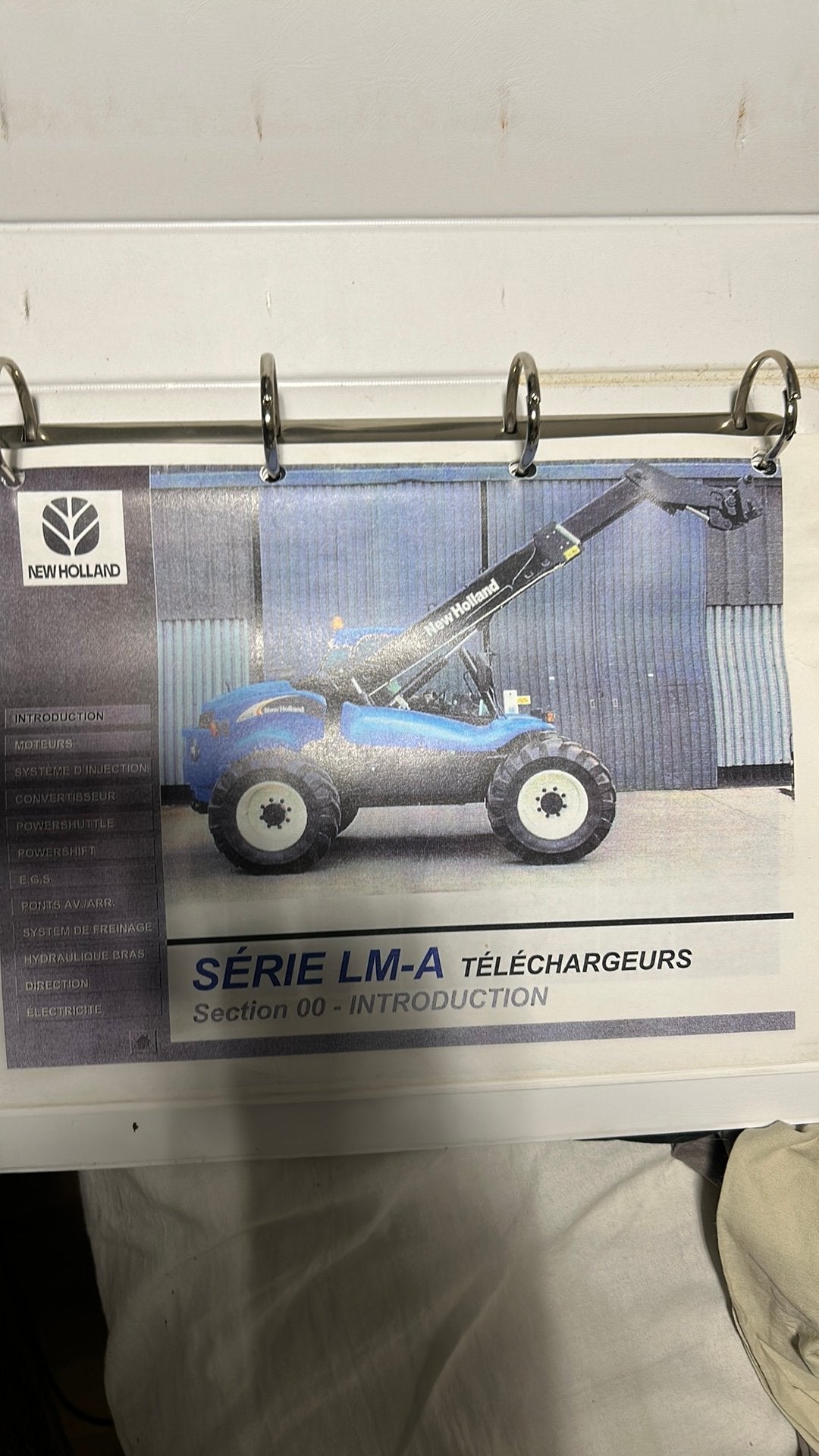 New holland werkplaatshandleiding, Enlèvement, Comme neuf