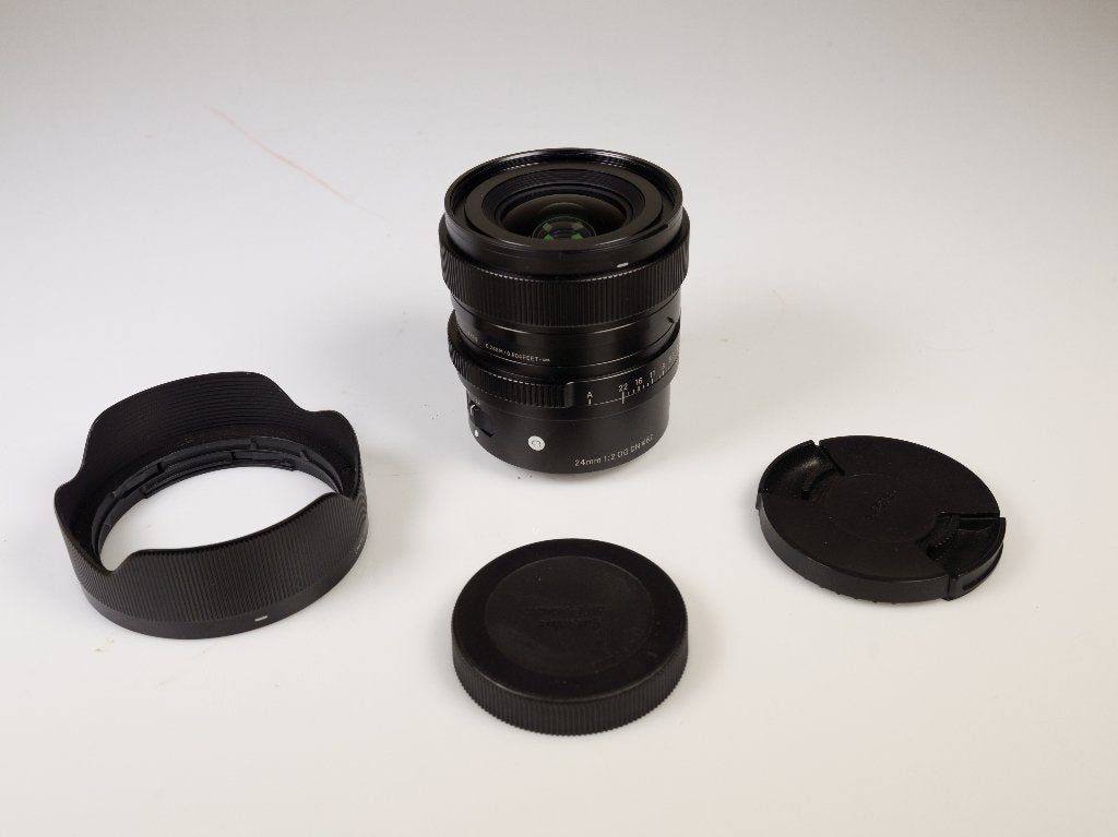 Sigma 24 mm F/2 DG DN Contemporary Sony FE, attention !, Sigma, Enlèvement ou Envoi, Monture Sony E, Comme neuf