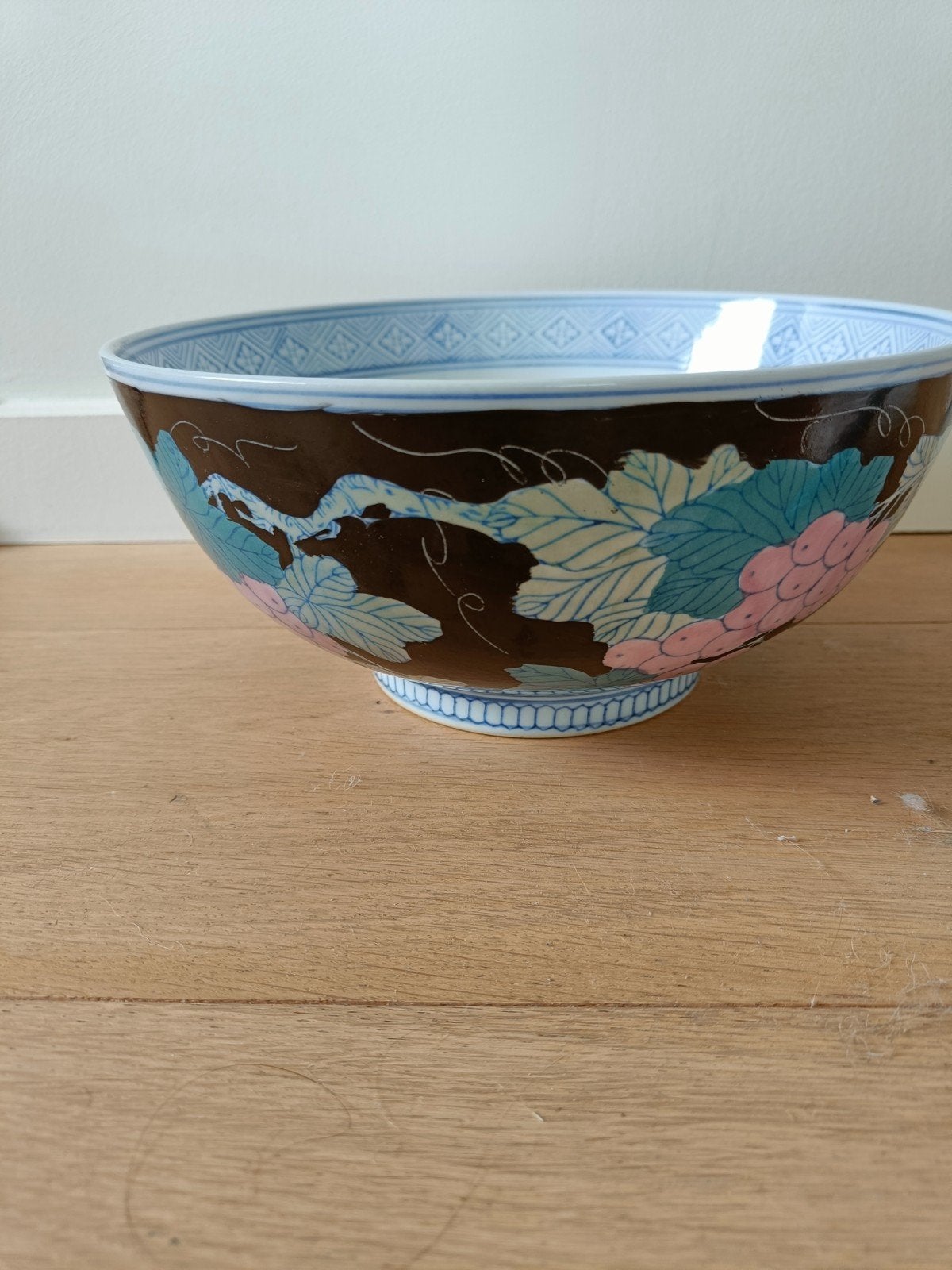 Kom chinees met wijnbladeren, Ophalen