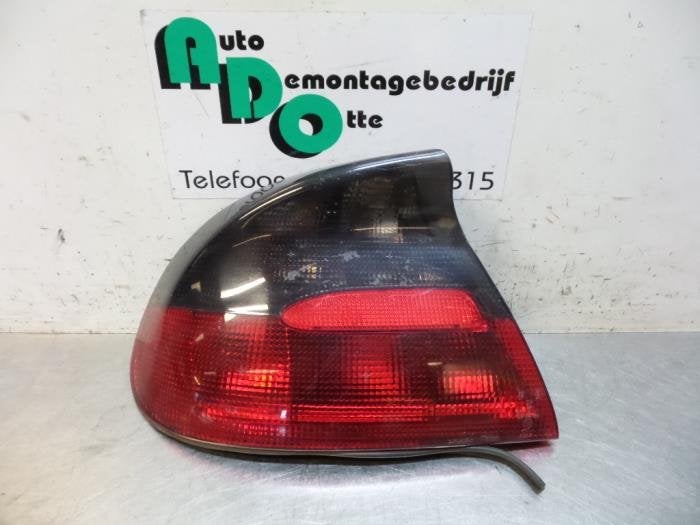 Feu arrière gauche d'un Opel Tigra (Tigra 94-), Autos : Pièces & Accessoires, -, 3 mois de garantie, Utilisé, -