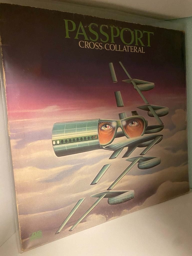 Passport – Cross-Collateral 1975 (J), CD & DVD, LP, Utilisé, Jazz, Envoi