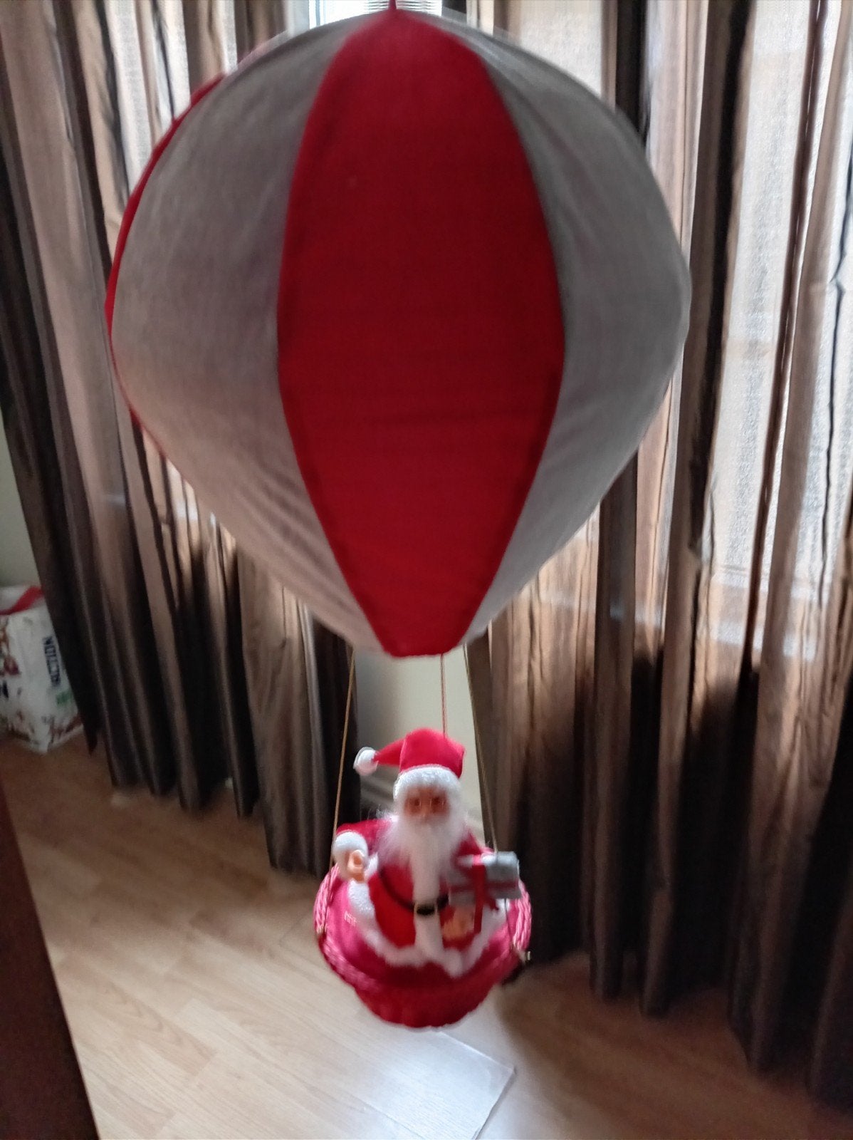 luchtballon met kerstman, Ophalen