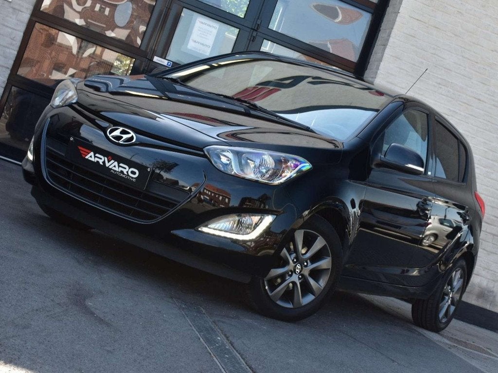 Hyundai i20 1.2i Go! Cruise / PDC / Verw Zetels / 1e Eig / G, Auto's, Hyundai, Voorwielaandrijving, Euro 5, Stof, Zwart