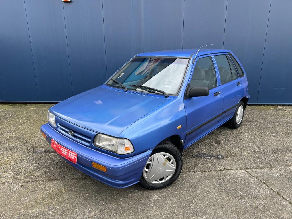 Kia Pride 1.3i Benzine Automaat 65.000km kan gekeurd worden, Auto's, Kia, Stof, 4 cilinders, Blauw, Bedrijf
