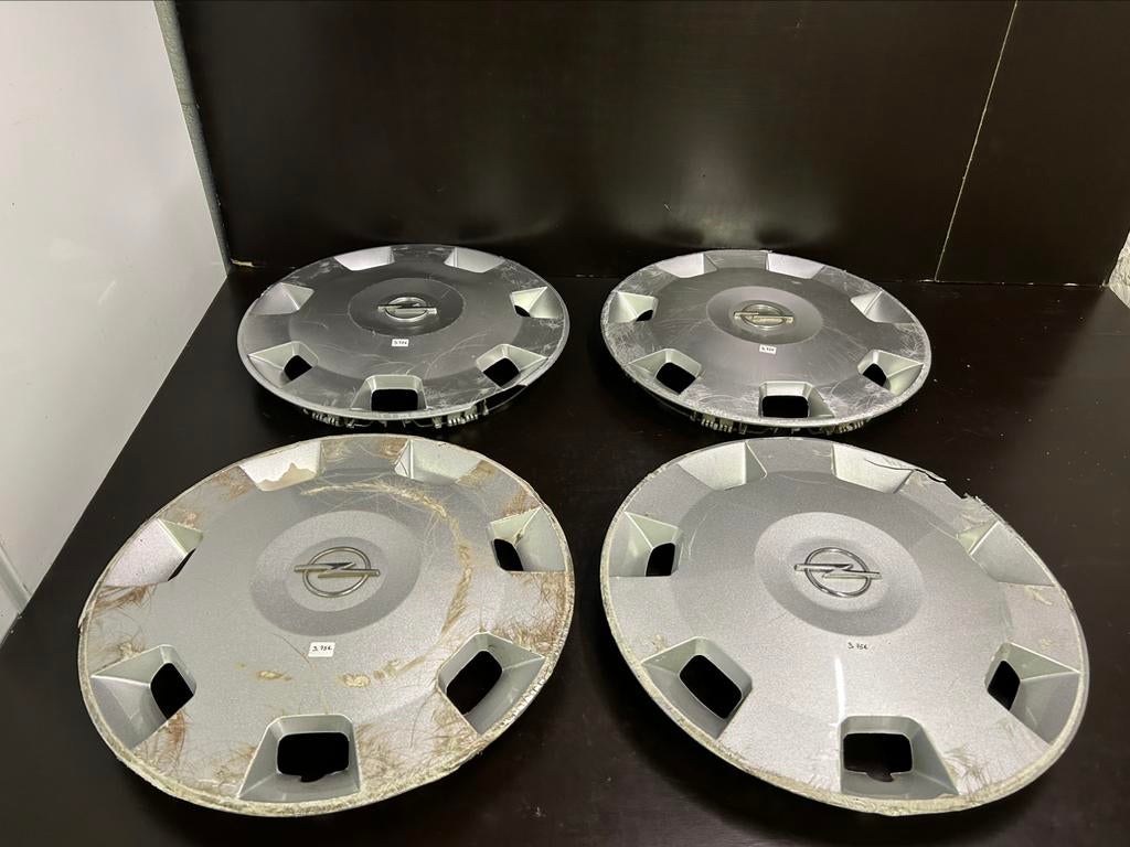 4 enjoliveurs Opel corsa astra combo 14", Enlèvement ou Envoi, Utilisé