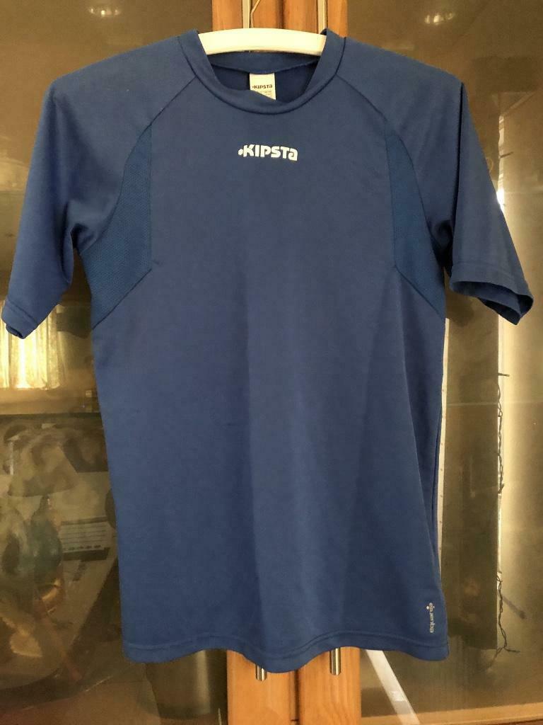 Sport shirt "kipsta" fel blauwe kleur mt 146 of 12 jaar, Gebruikt, Kipsta, Ophalen of Verzenden, Shirt of Longsleeve