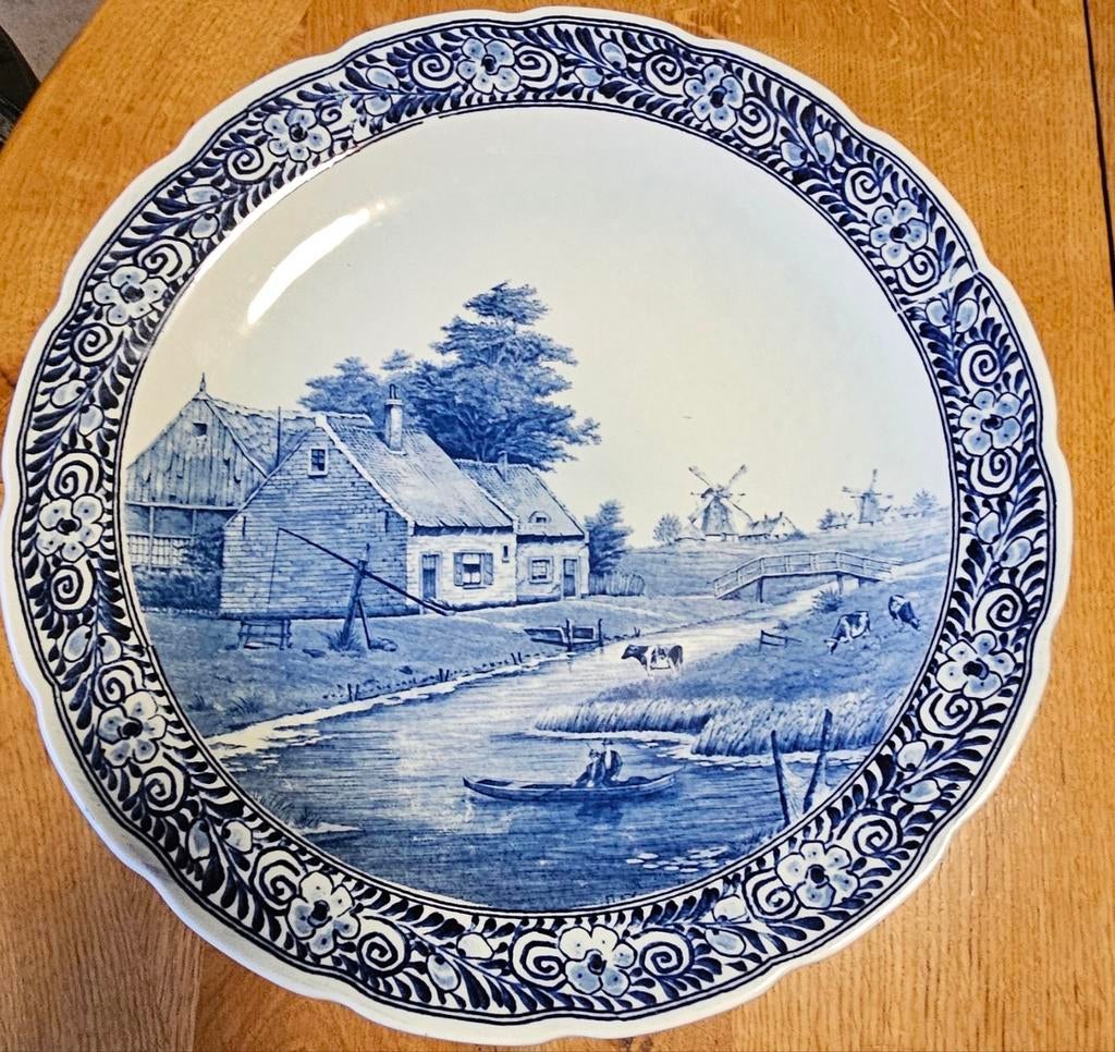 Delfts blauw bord, Ophalen