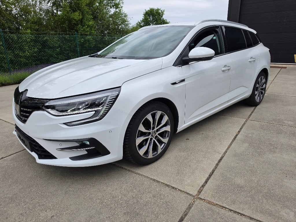 Renault Megane Grand Tour 1.4 TCe Automaat + Garantie, Wit, Bedrijf, 5 deurs, https://public.car-pass.be/vhr/0a7bffa0-cd5f-4919-aad3-079d312864f2