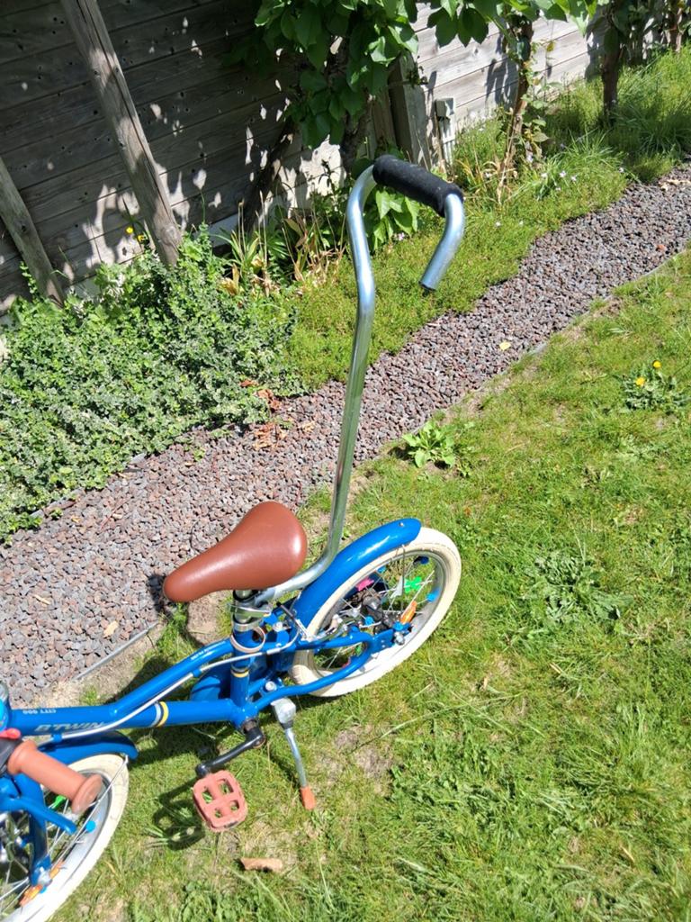 Steunstang kinderfiets (ipv steunwieltjes ), Ophalen