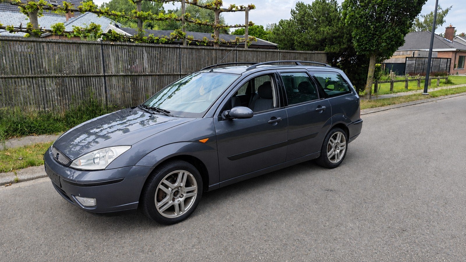 Ford Focus 1.6i benzine Euro 4  km 137 861 Carpass, Auto's, Stof, Parkeersensor, Zwart, 1595 cc