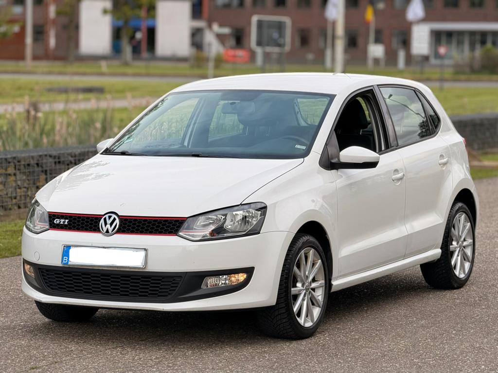 Volkswagen Polo 1.4i benzine Met keuring voor verkoop, Auto's, Euro 5, Zwart, 4 cilinders, Wit