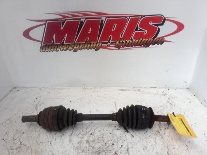 Arbre de transmission avant gauche d'un Opel Corsa, -, -, Opel, 3 mois de garantie