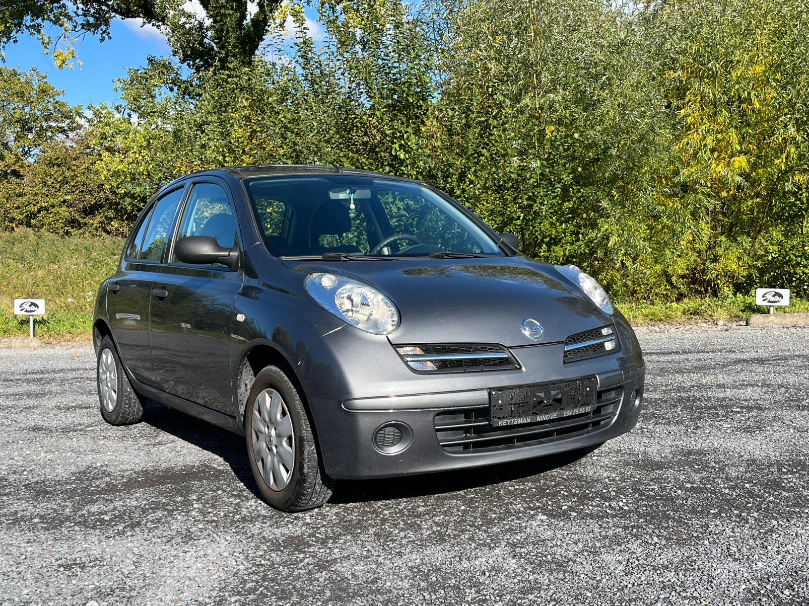 Nissan Micra 2007 benzine 154000km, Auto's, Stof, Elektrische ramen, Euro 4, Zilver of Grijs