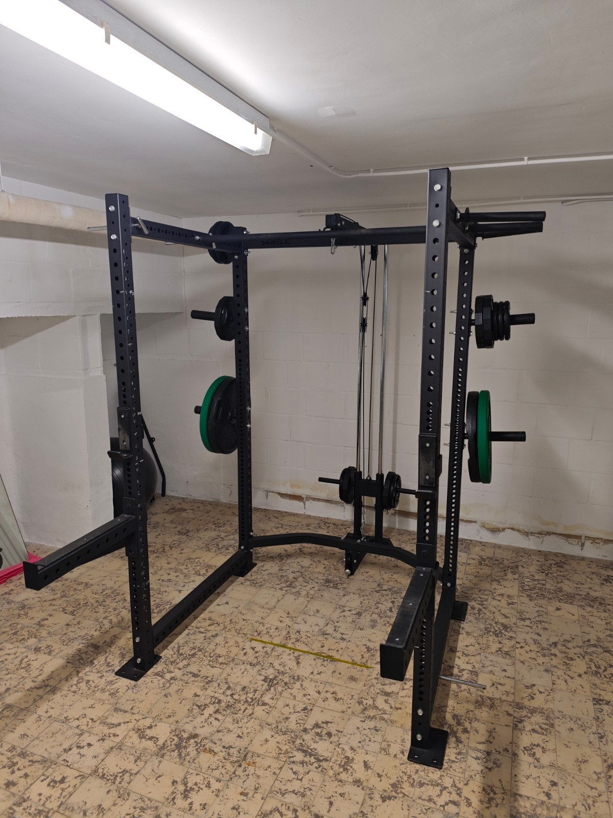 Squat rack cage met cable station, Ophalen