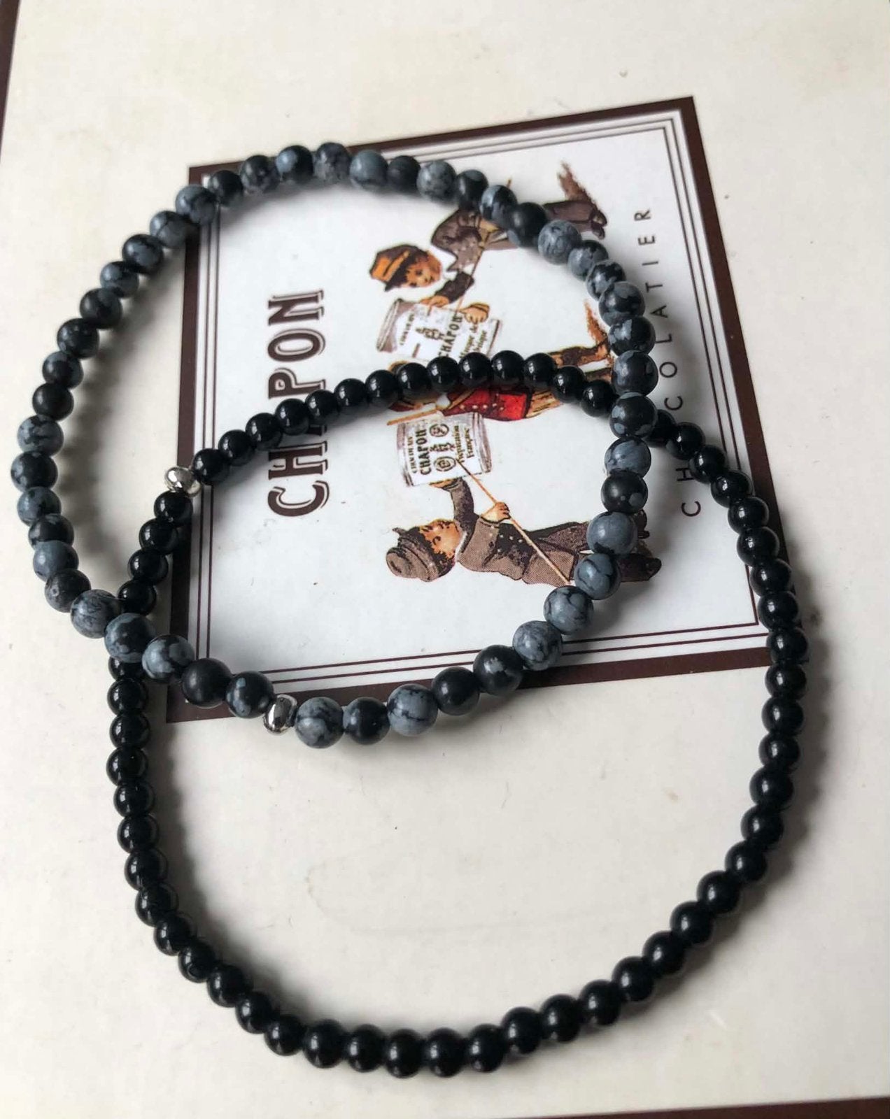 Twee armbanden van onyx en obsidiaan, Ophalen of Verzenden, Zo goed als nieuw