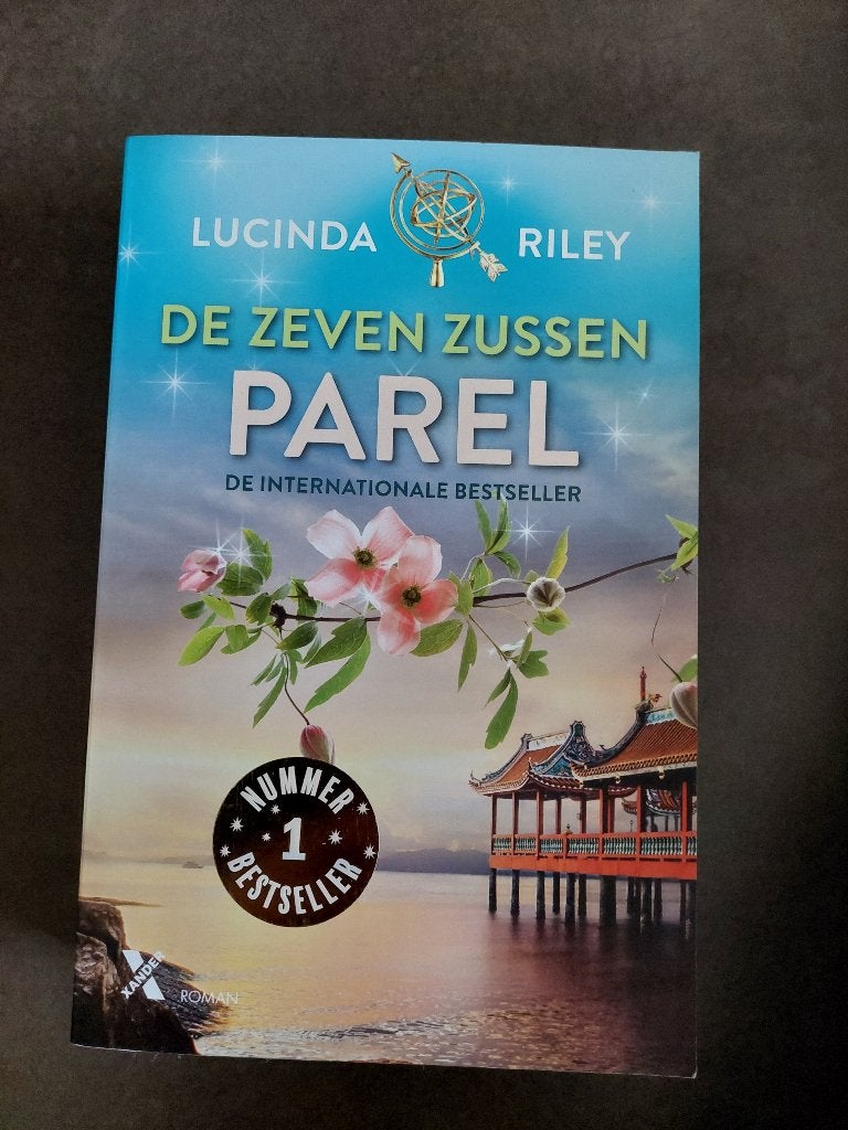 De Zeven Zussen Parel (deel 4 uit de reeks De Zeven Zussen), Ophalen of Verzenden, Zo goed als nieuw, Lucinda Riley