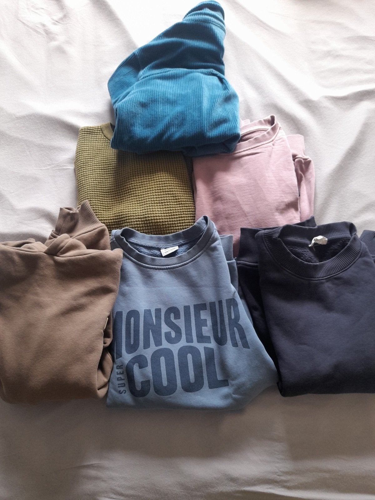 Pakket 6 jongenstruien, Ophalen
