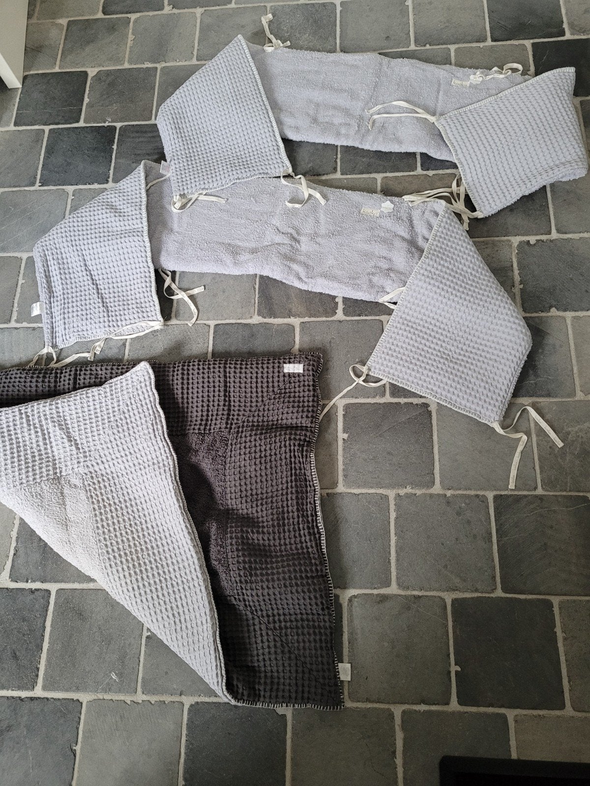 Omranding voor babypark van Koeka, Ophalen