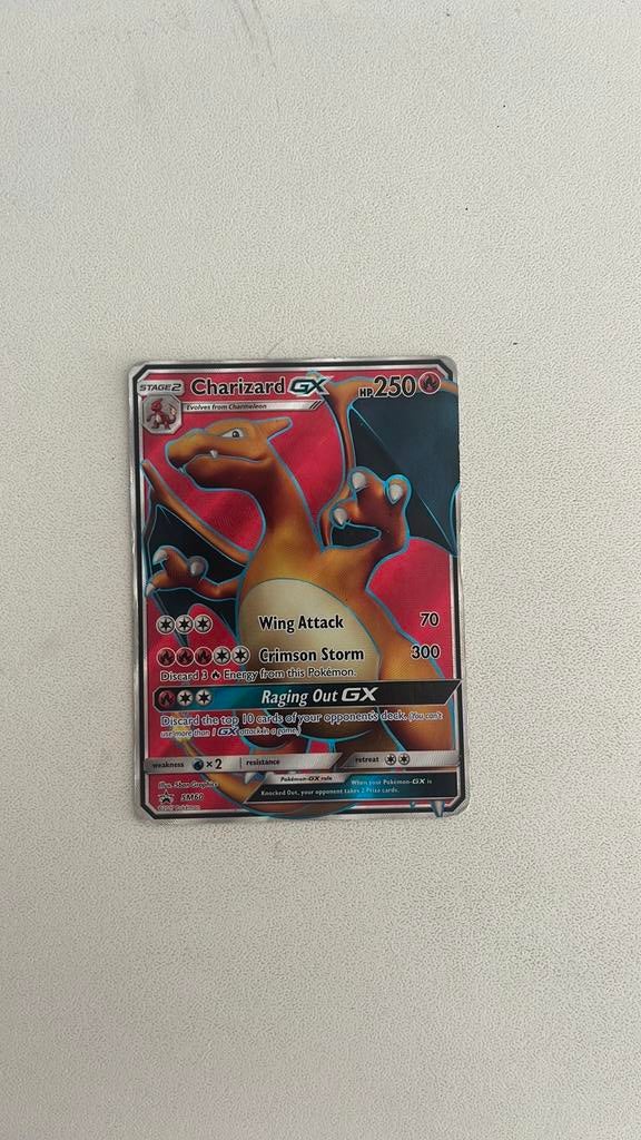 Charizard GX SM60, Ophalen of Verzenden, Zo goed als nieuw, Losse kaart, Foil
