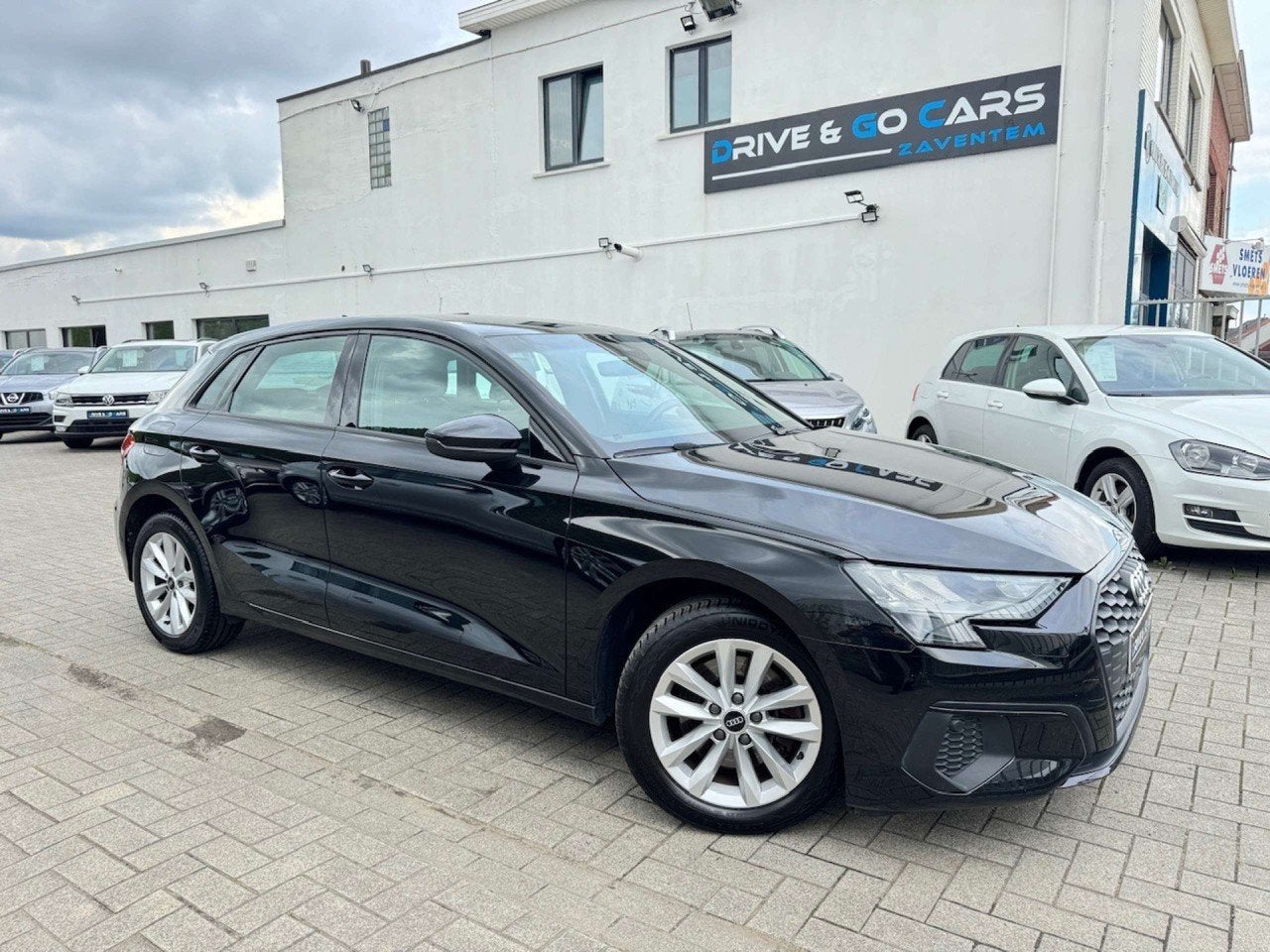 Audi A3 Sportback 30 TFSI - CarPlay * 1 JAAR GARANTIE *, Auto's, Audi, Stof, Gebruikt, Zwart, Bedrijf