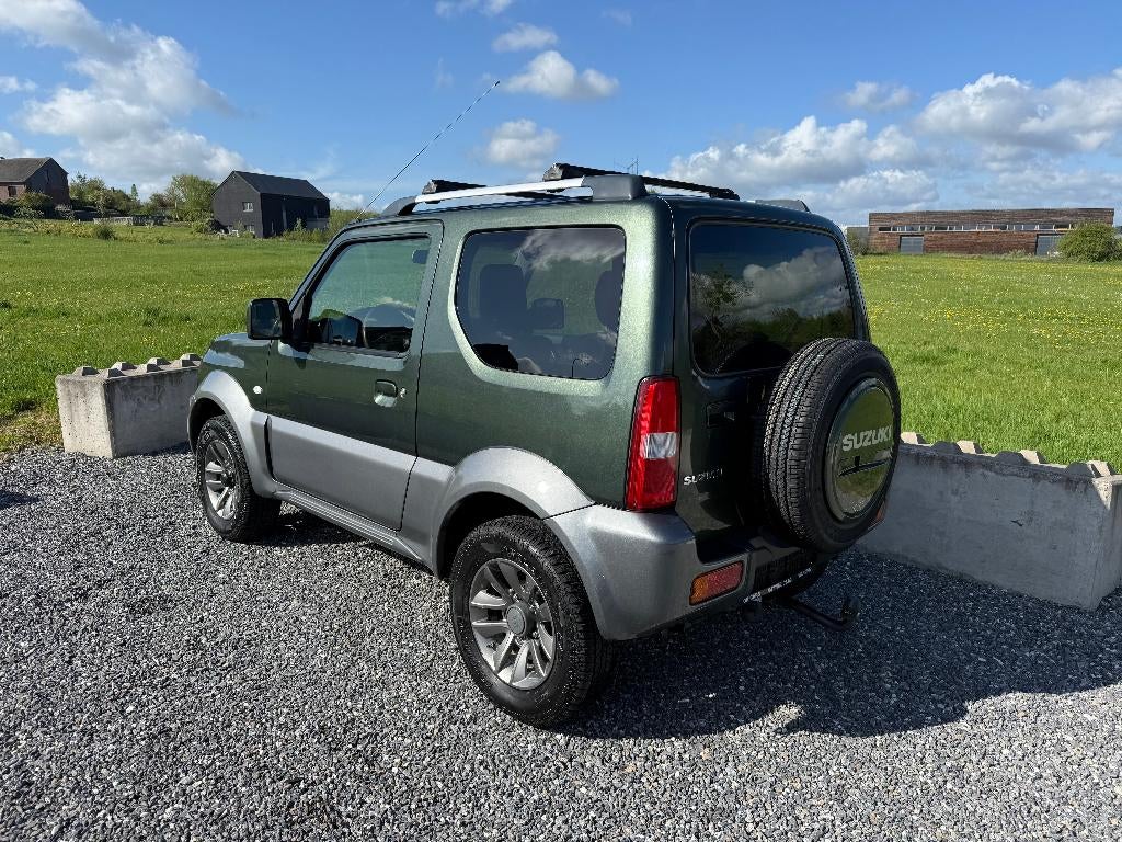 Suzuki Jimny 1.3 85CH DAKOTA **Cuir 4X4 Clim Attelage**, Auto's, Suzuki, 1328 cc, Handgeschakeld, Vierwielaandrijving, 4x4