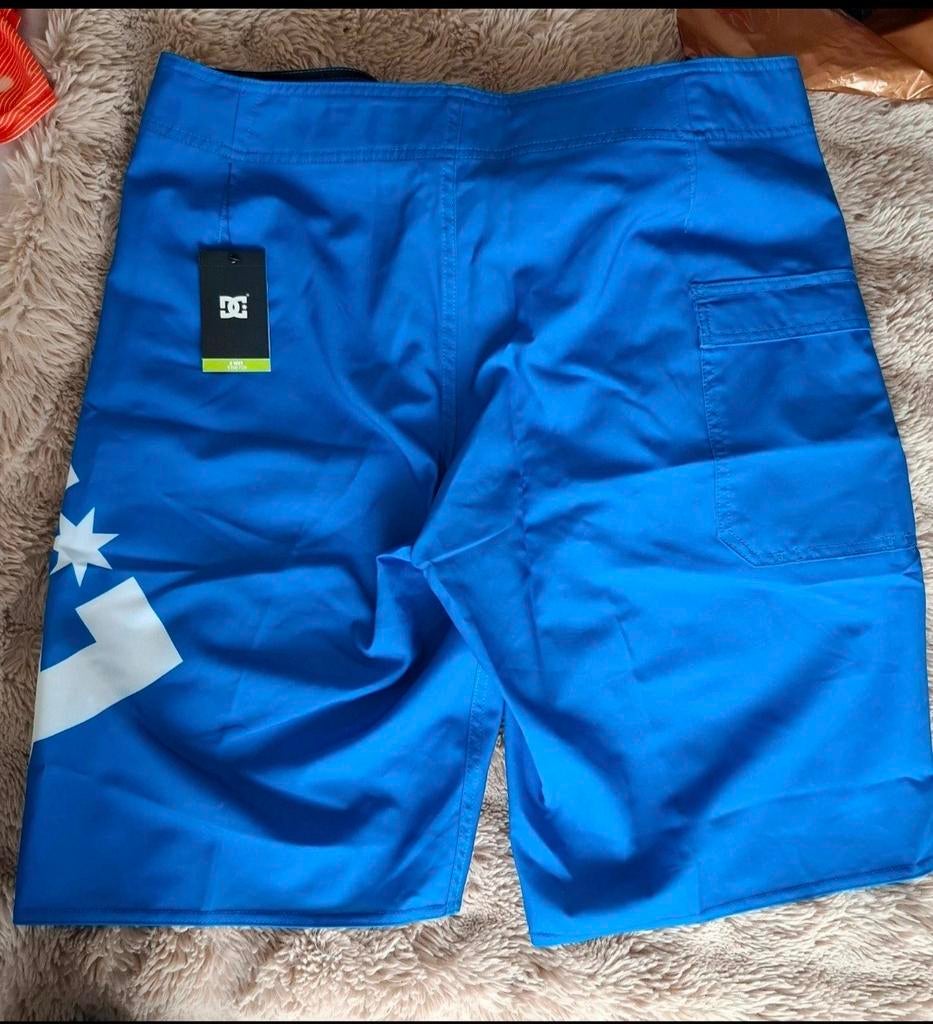 DC Shoes Bermuda/Boardshorts – Maat 34 – Nieuw met prijskaar, Ophalen of Verzenden, Blauw