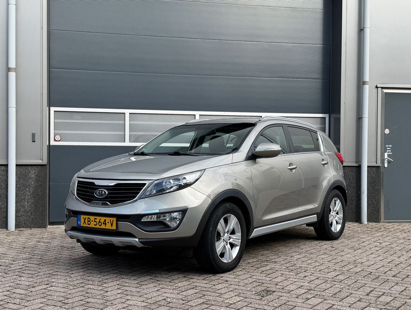 Kia Sportage 1.6 GDI ISG X-ecutive Plus Pack bj.2012 Clima|T, Auto's, Handgeschakeld, Grijs, SUV of Terreinwagen, Sportage