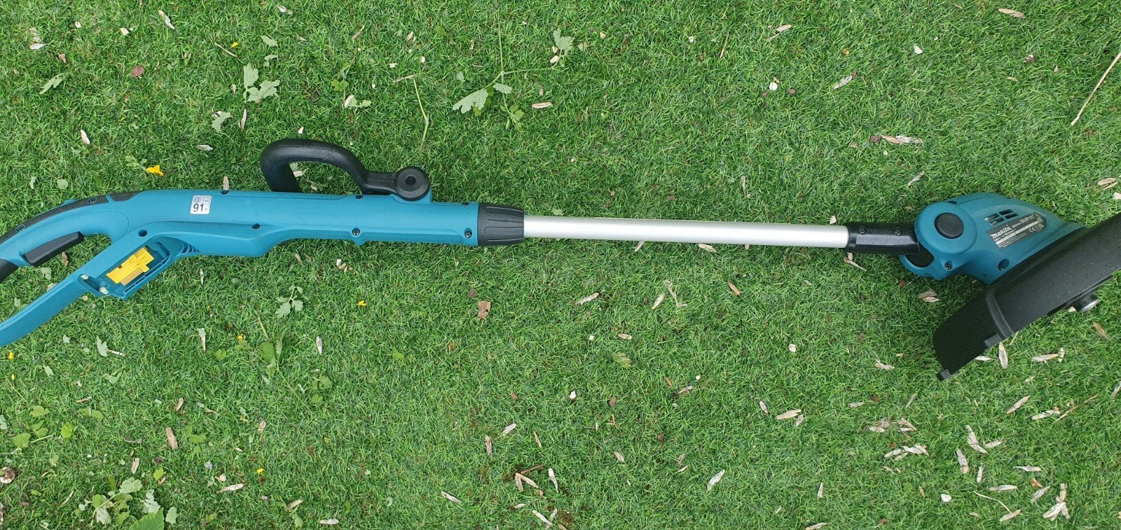 Makita 18V Accu DUR181Z trimmer, Ophalen