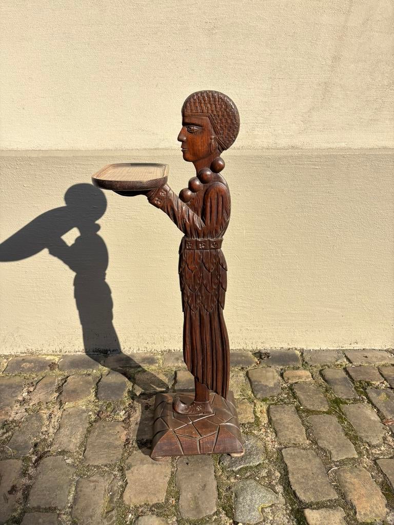 Houten art deco display, Ophalen