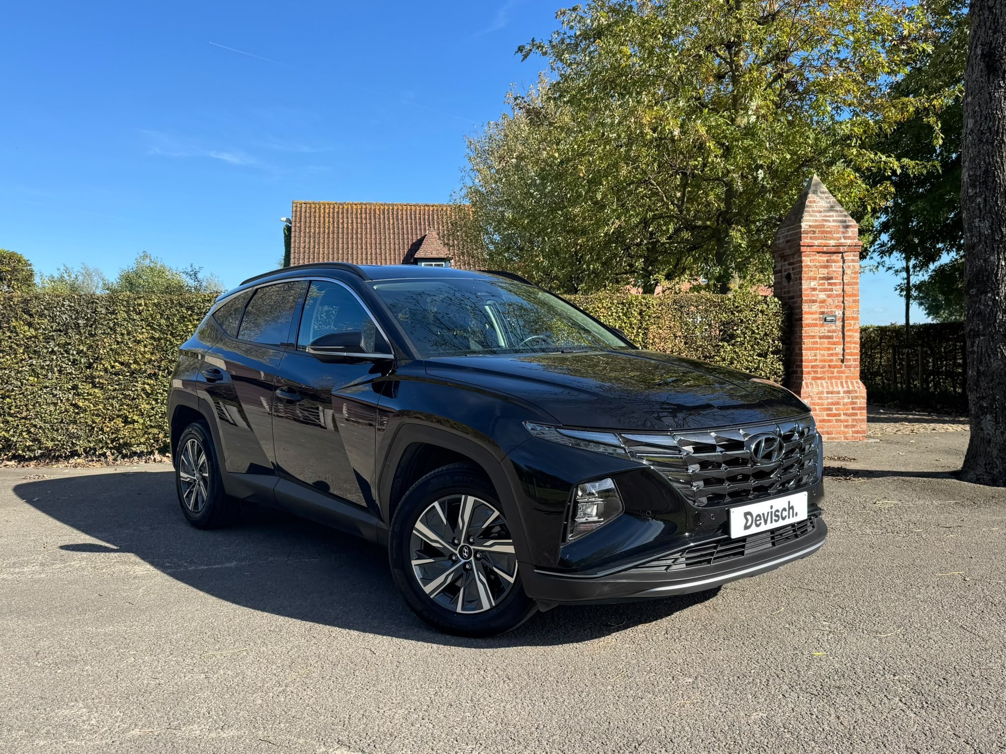 Hyundai NX4 TUCSON HEV FEEL - hybride automaat (bj 2021), Auto's, Stof, Gebruikt, 169 kW, Bedrijf