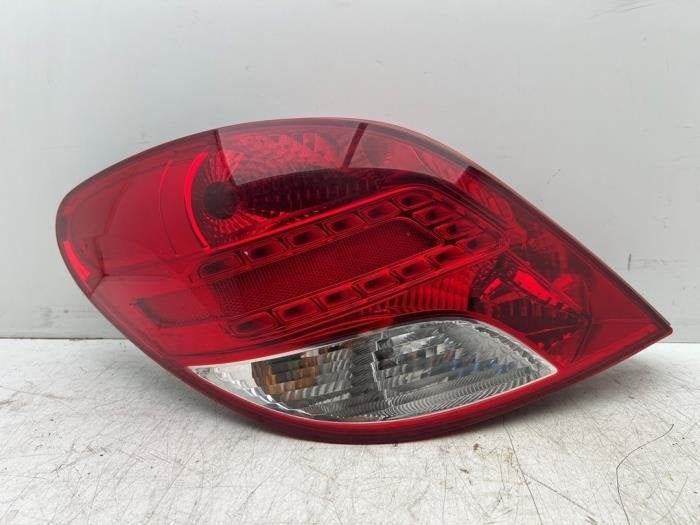Feu arrière gauche d'un Peugeot 207, Autos : Pièces & Accessoires, Éclairage, -, 3 mois de garantie, Utilisé, -