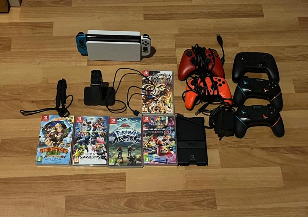 Switch oled avec jeux et manettes, Consoles de jeu & Jeux vidéo, Enlèvement, Comme neuf, Switch OLED, Avec jeux