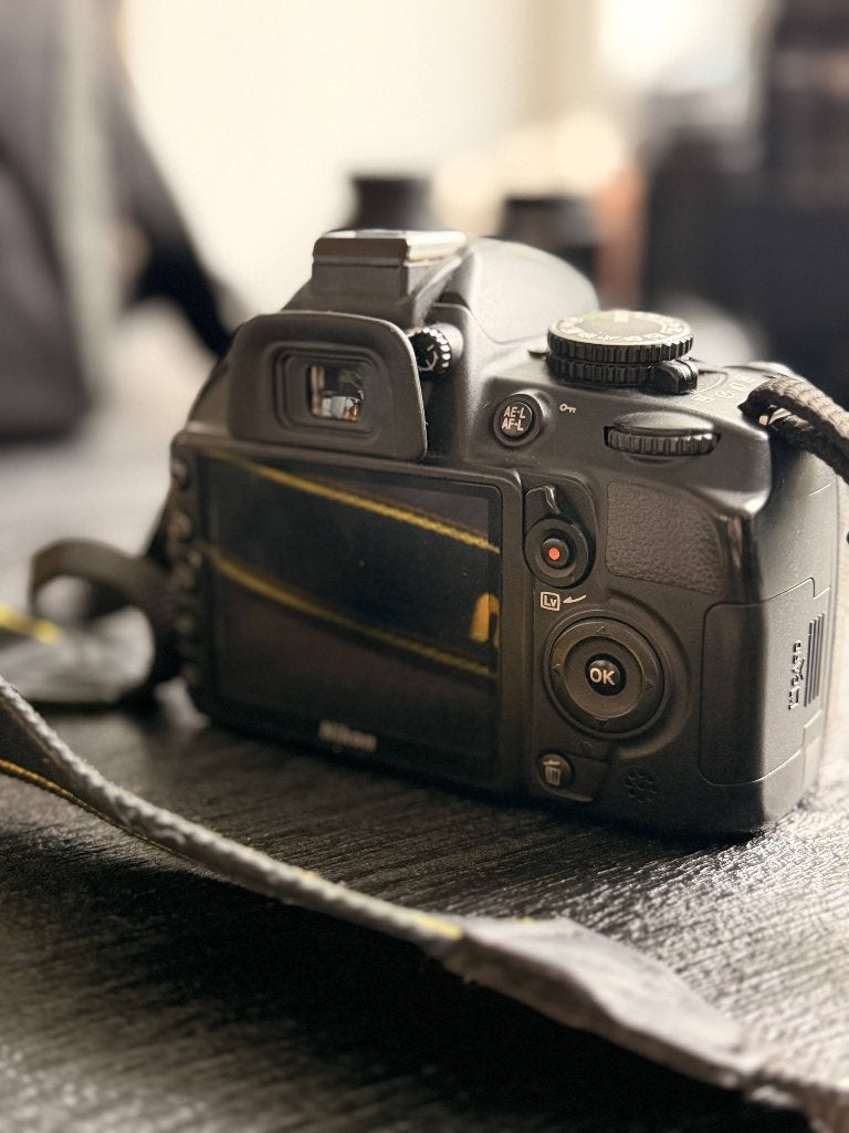 Nikon D3100 + 18-55mm VR-lens + tas en accessoires, 14 megapixels, Spiegelreflex, Ophalen of Verzenden, Nikon
