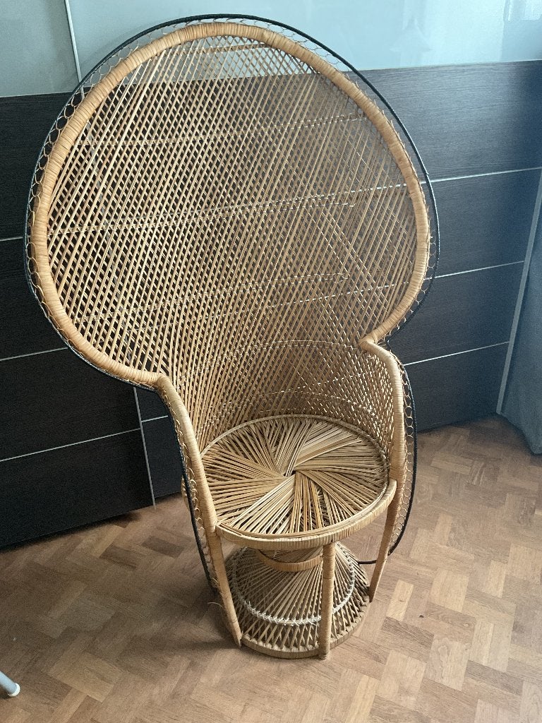 pauwstoel rotan, Ophalen