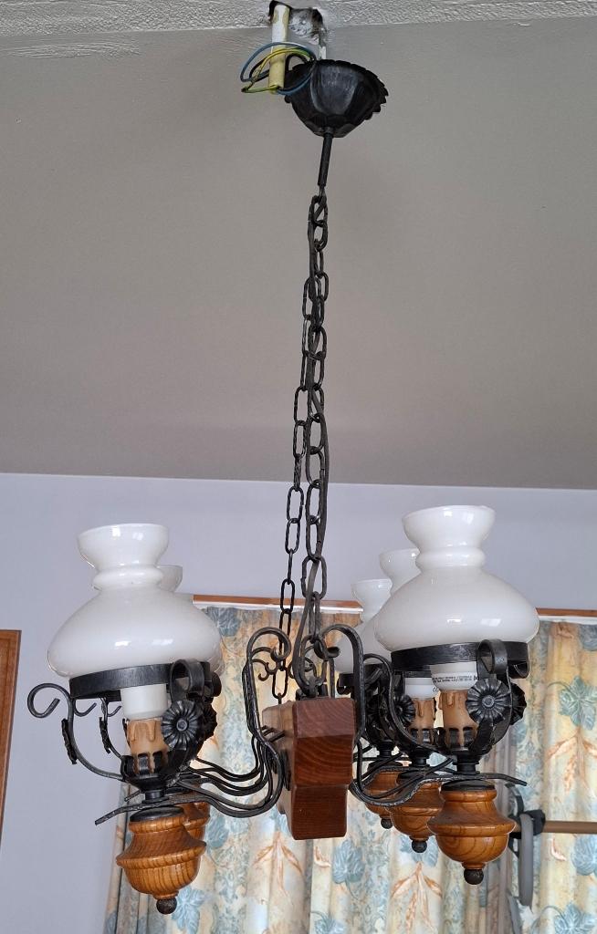 Antieken houten luster, Ophalen