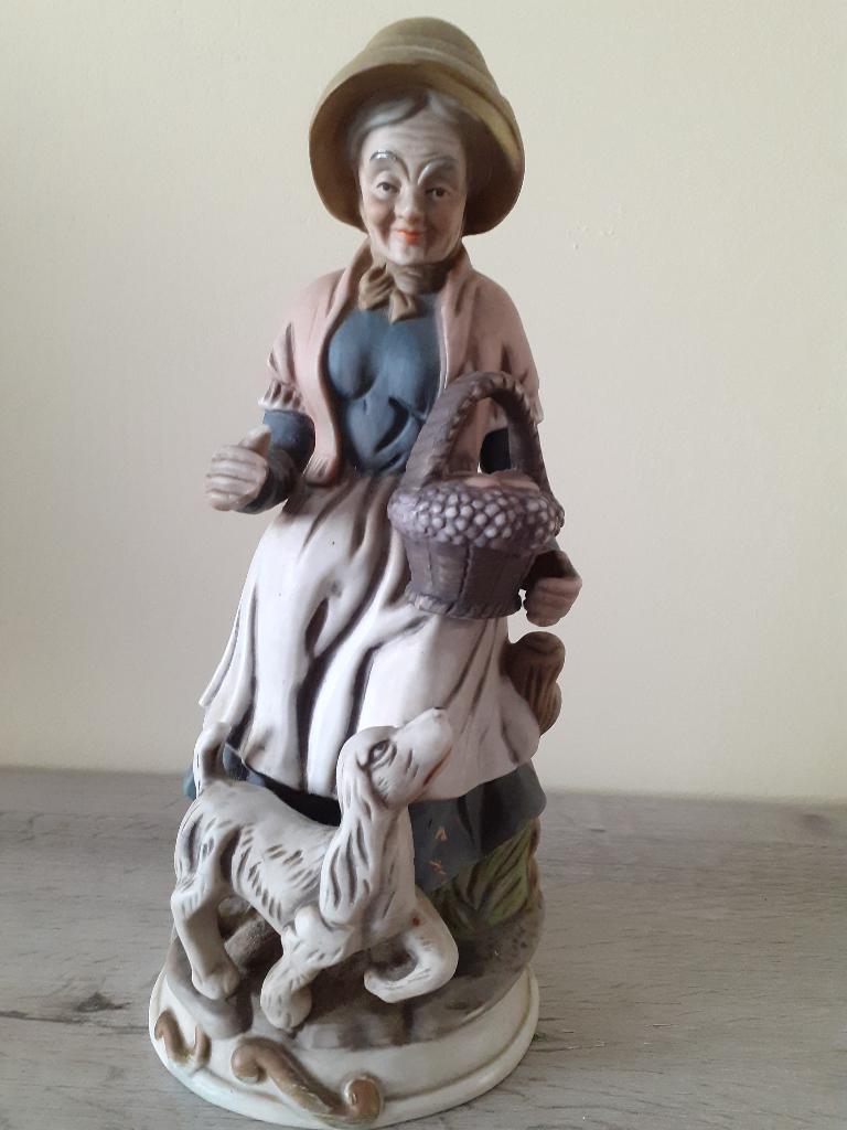 Beeldje in aardewerk (Vrouw met hondje), Enlèvement