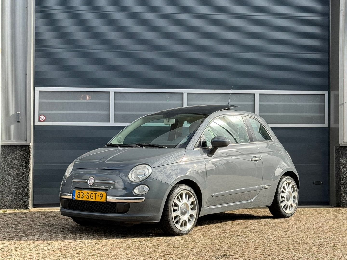 Fiat 500 1.2 Lounge bj.2011 Pano|Airco|LM velg|Nap., Auto's, Automaat, 110 g/km, Verwarmde buitenspiegels, Grijs