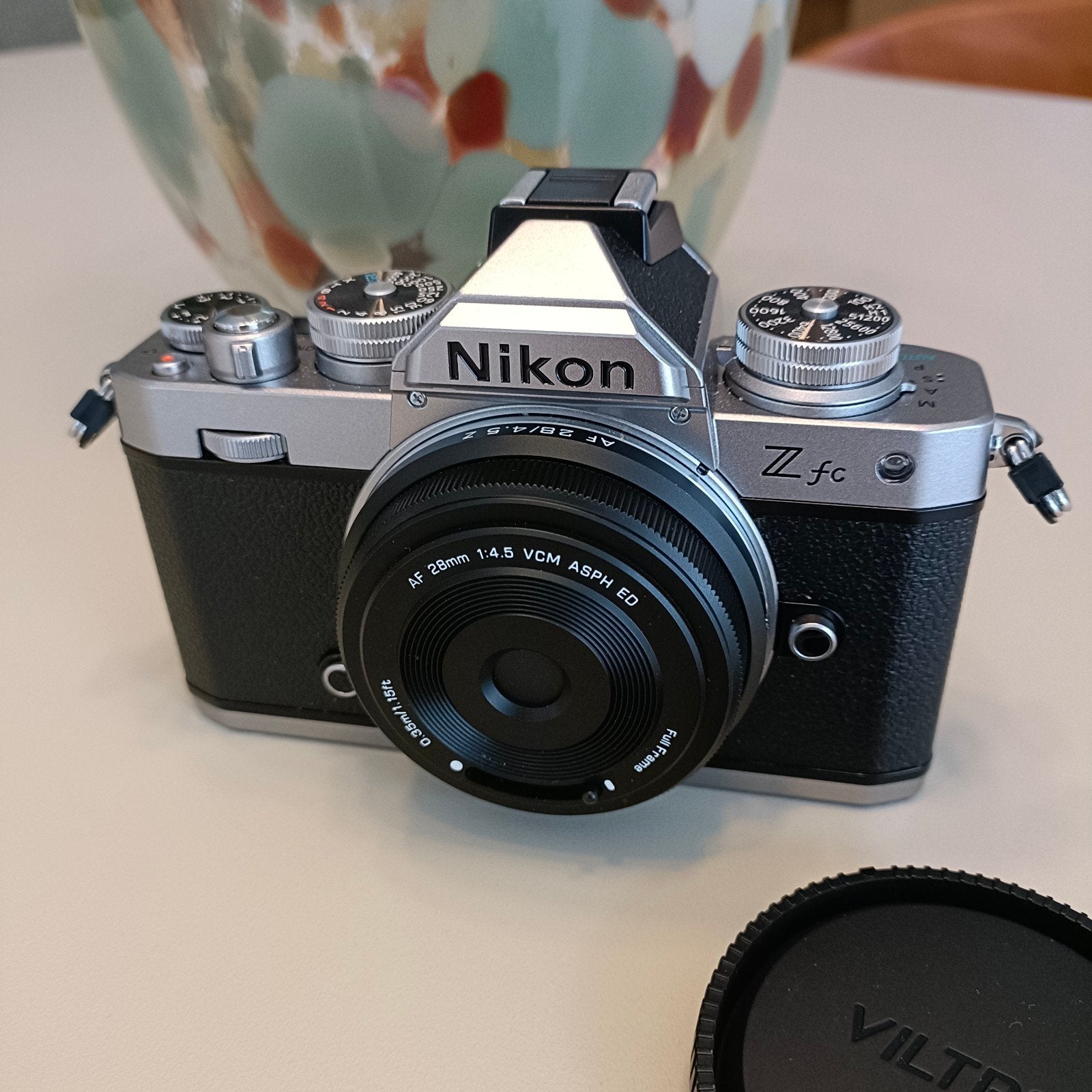 Nikon Z Fc body (550€), lens (50€), Ophalen of Verzenden, Zo goed als nieuw, Draagriem, Nikon