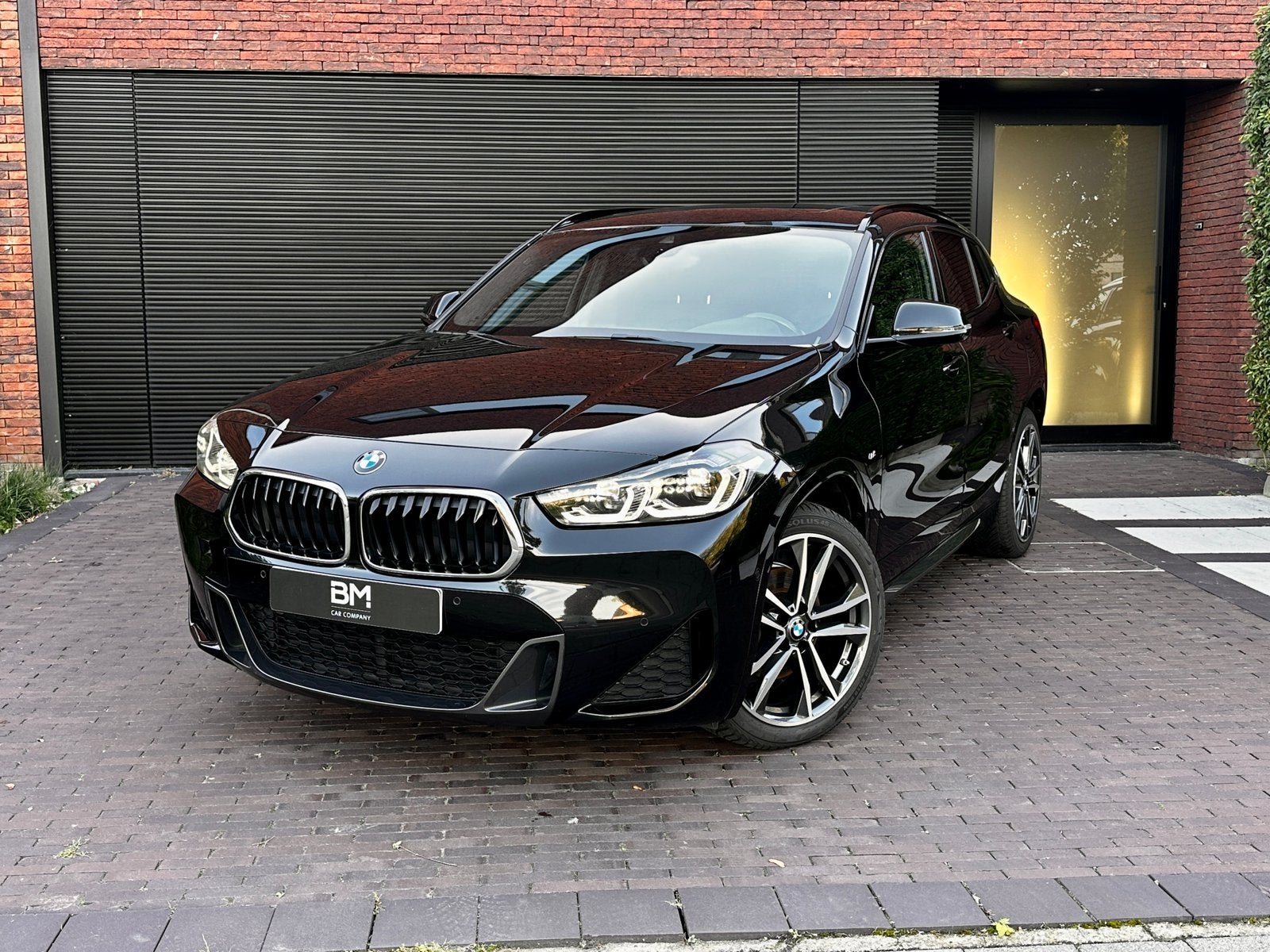 Bmw x2 Sdrive 18 I AUTOMAAT DKG M-SPORT, Auto's, X2, Euro 6, Lichtsensor, Leder en Stof