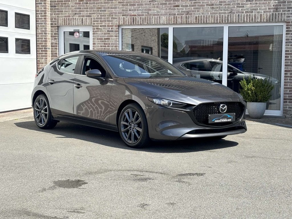 Mazda 3 2.0 SKY-X Exclusive-line / 32000km / Fabriekswb, Autos, Mazda, Argent ou Gris, Euro 6, Entreprise, Boîte manuelle