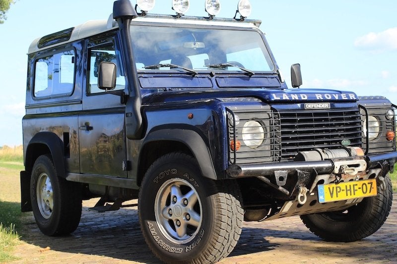 Landrover Defender 300 TDI 1997, Auto's, Stof, Blauw, Open dak, Defender
