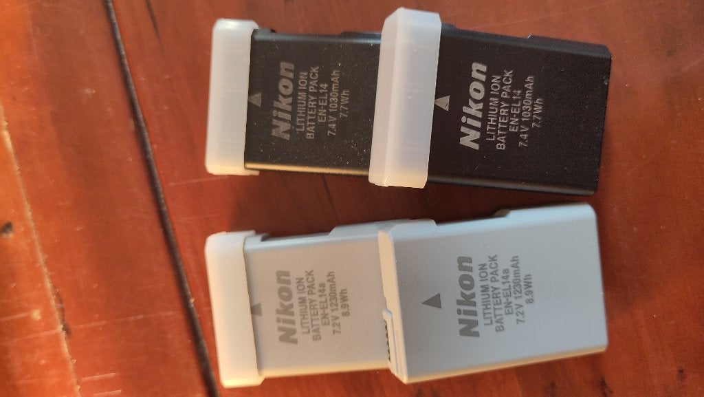 Vier Nikon batterijen, EN-EL 14 en 14a, Audio, Tv en Foto, Fotografie | Accu's en Batterijen, Gebruikt, Nikon, Nikon, Ophalen of Verzenden