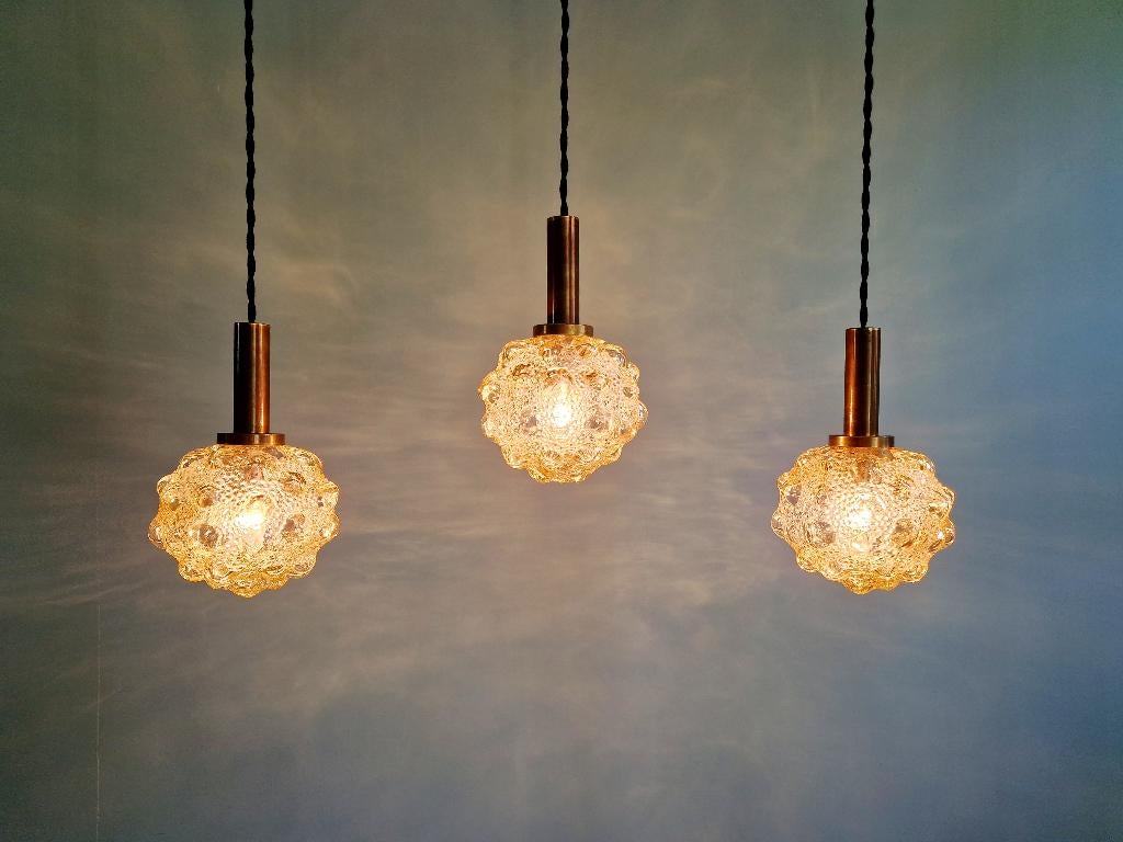 Amberkleurige glazen suspensie met bubbels, H. Tynell, 1970, Antiek en Kunst, Ophalen of Verzenden
