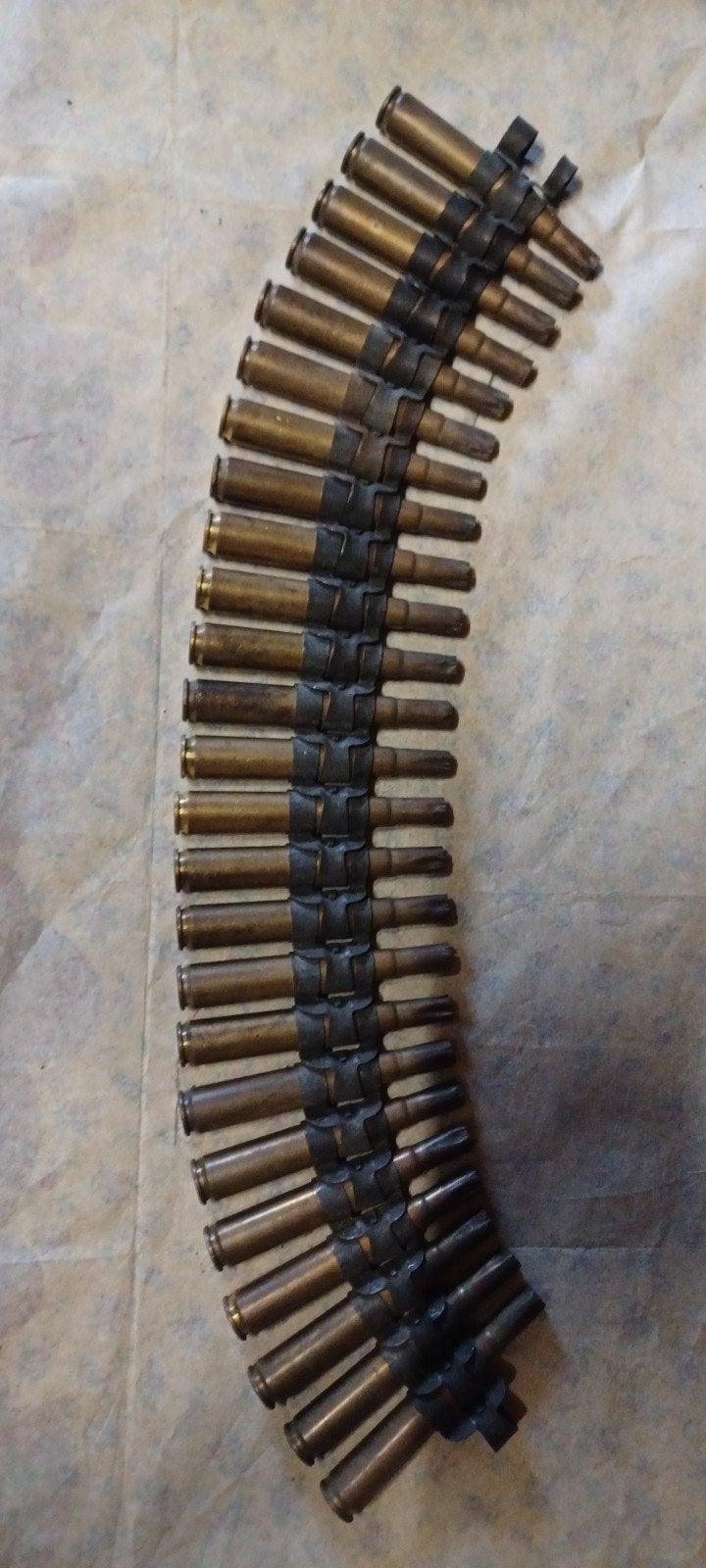 Lege hulzen cal. .50/12.7 mm, Ophalen