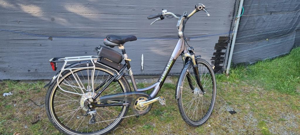 Elektrische fiets PRESTIG goede staat batarij is goed motor, Fietsen en Brommers, Fietsaccessoires | Fietsbellen, Ophalen